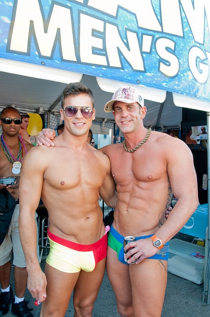 Men, promoting Steamworks, the local gay men's sauna in Chicago, ManAboutWorld gay travel magazine